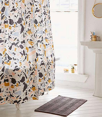 Image of Shower Curtain from Urban Outfitters in a blog post about better bathrooms from forthefloorandmore.com