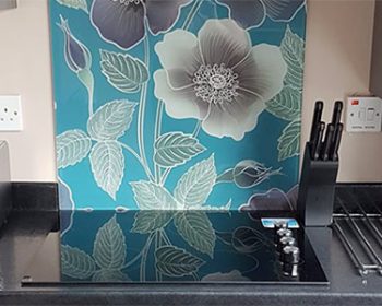 Image of Ila glass splashback shown in a post about kitchen splashback reviews from forthefloorandmore.com