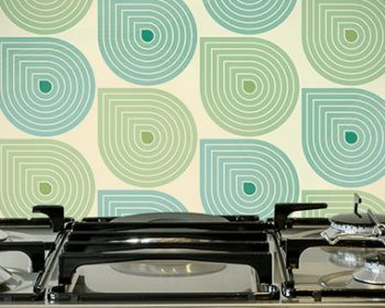 Close up image of a glass splashback used in a blog post on how to fit glass splashbacks by forthefloorandmore.com