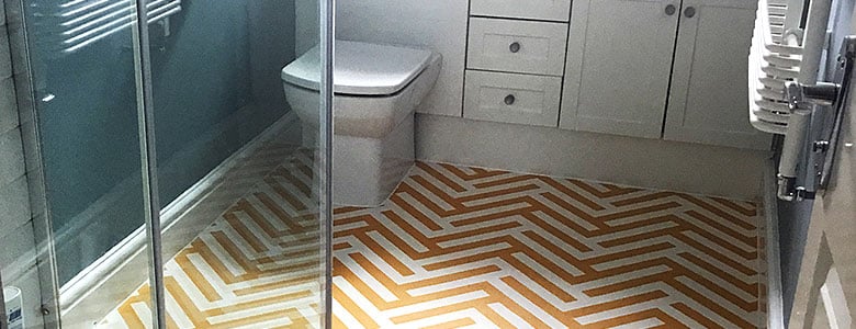 Herringbone Ochre flooring seen in a modern bathroom