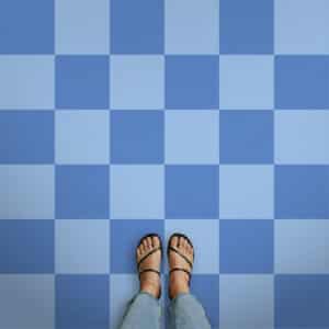Bespoke tonal checkerboard vinyl flooring produced by For the Floor & More