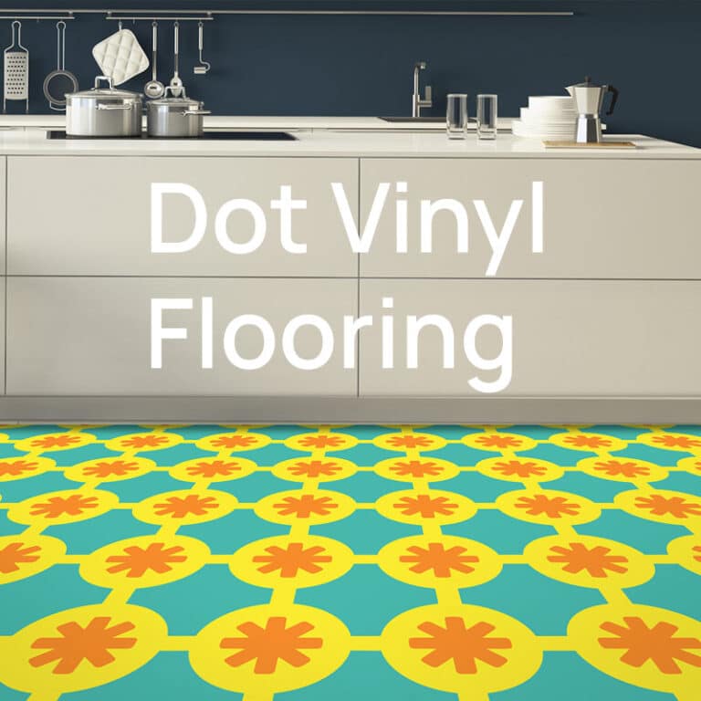 A kitchen with a turquoise vinyl floor patterned with yellow and orange dots