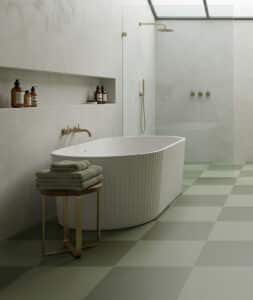 Image of a modern bathroom with tonal checkerboard vinyl flooring as produced by For the Floor & More