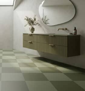 Image of a modern bathroom with tonal checkerboard vinyl flooring as produced by For the Floor & More