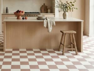 Image of a modern kitchen with tonal checkerboard vinyl flooring as produced by For the Floor & More
