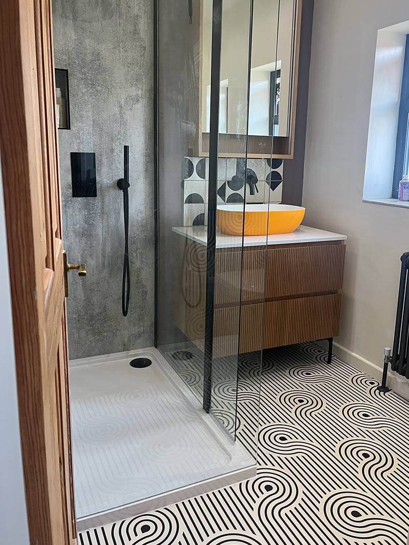 Atik patterned vinyl flooring in a small modern bathroom